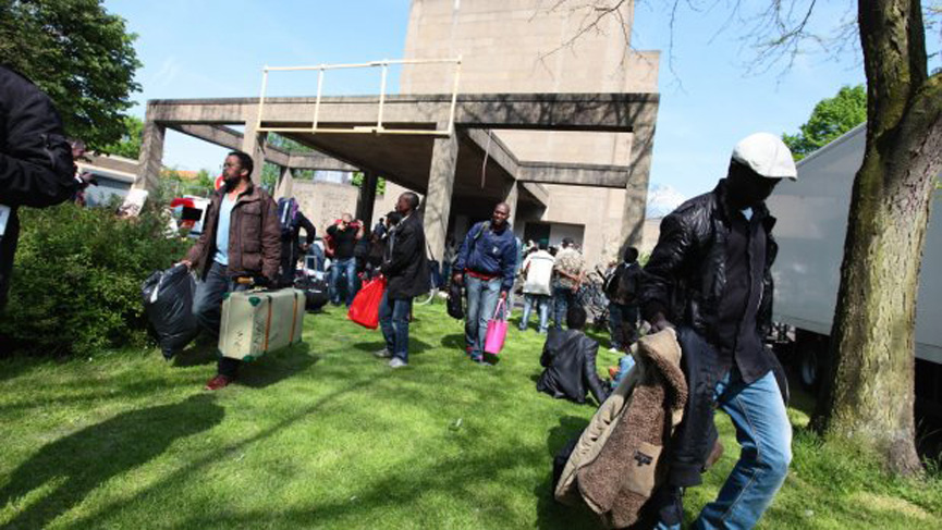 Refugees leaving the Vluchtkerk in early June