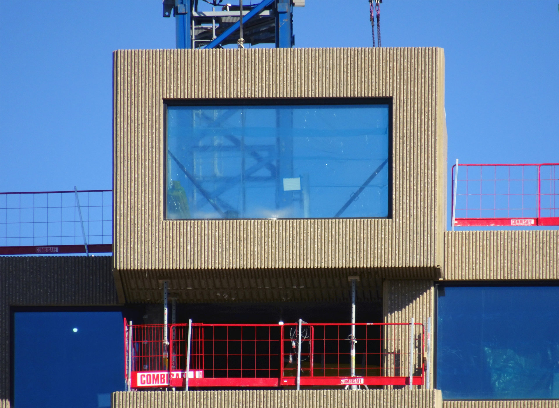 OMA Uses Brutalist Aesthetics to “Greywash” the Luxury High Rise